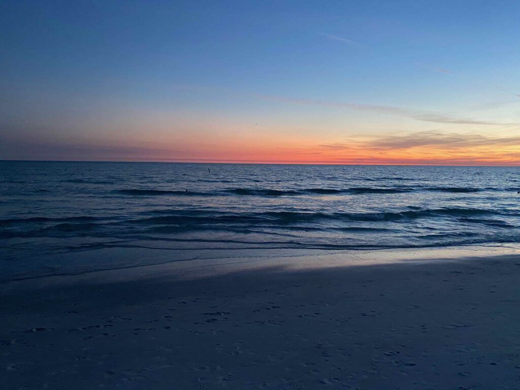 The beach at sunset.
